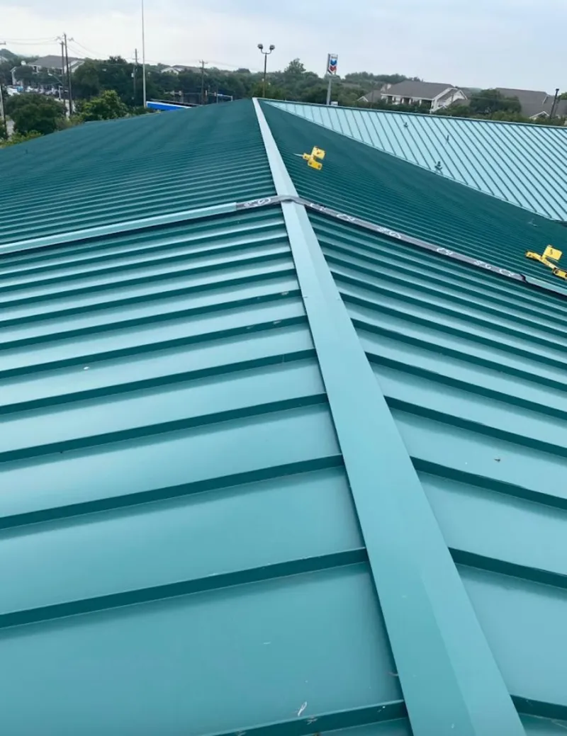 Green commercial metal roof ridge and valley for Metal Roof Repair in South San Gabriel